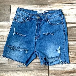 These are Jean shorts that have rips in them. The color is like a lightish blue